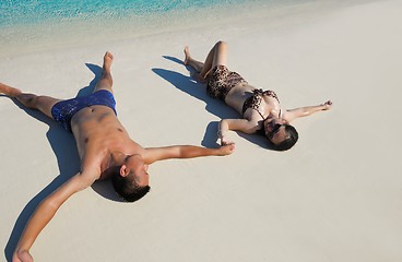 Image showing happy young  couple enjoying summer on beach