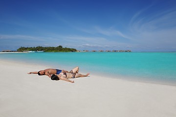 Image showing happy young  couple enjoying summer on beach