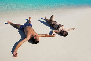 Image showing happy young  couple enjoying summer on beach