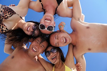 Image showing group of happy young people have fun on bach