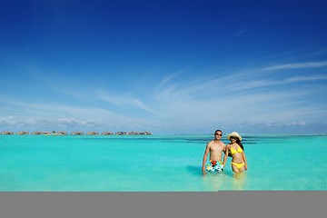 Image showing happy young  couple enjoying summer on beach