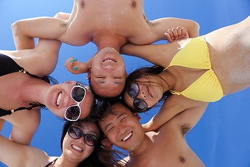 Image showing group of happy young people have fun on bach