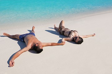 Image showing happy young  couple enjoying summer on beach