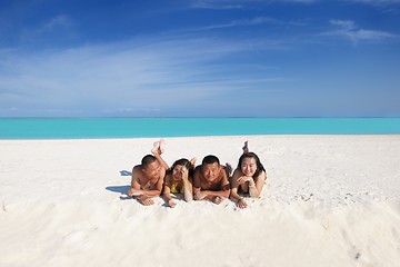 Image showing group of happy young people have fun on bach