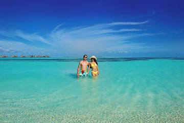 Image showing happy young  couple enjoying summer on beach