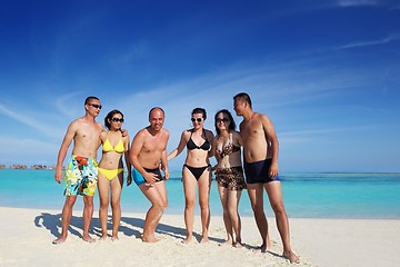 Image showing group of happy young people have fun on bach