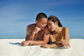 Image showing happy young  couple enjoying summer on beach