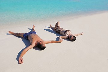 Image showing happy young  couple enjoying summer on beach