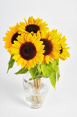 Image showing Sunflowers in a glass vase