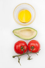 Image showing Tomatoes, avocado and olive oil