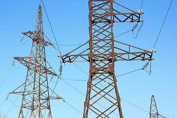 Image showing high voltage post against the blue sky