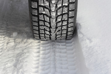 Image showing Snowy winter road ahead an unrecognizable car