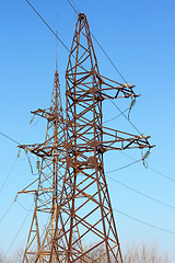 Image showing high voltage post against the blue sky