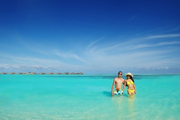 Image showing happy young  couple enjoying summer on beach