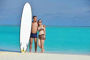 Image showing happy young  couple enjoying summer on beach