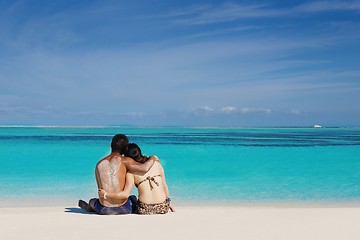 Image showing happy young  couple enjoying summer on beach