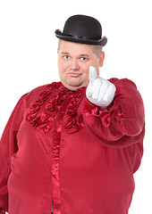 Image showing Obese man in a red costume and bowler hat