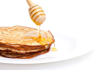 Image showing Delicious Freshly Prepared Pancakes with Honey