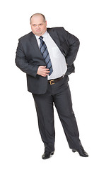 Image showing Fat businessman glowering at the camera