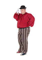 Image showing Obese man in a red costume and bowler hat