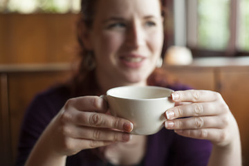 Image showing Woman Holding Her Morning Cup of Coffee