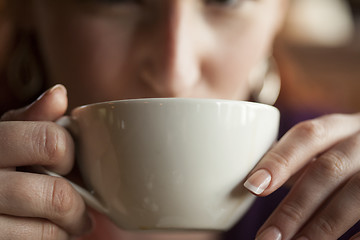 Image showing Woman Holding Her Morning Cup of Coffee