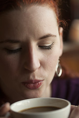 Image showing Woman Holding Her Morning Cup of Coffee