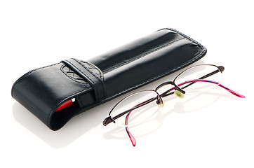 Image showing Leather pencil case and glasses