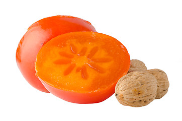 Image showing Ripe persimmons and nuts