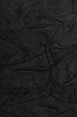 Image showing Natural qualitative black leather texture. Close up. 