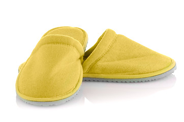 Image showing A pair of yellow slippers