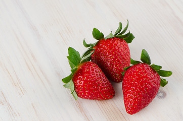 Image showing Three fresh strawberries