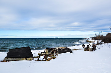 Image showing Old boats and winches