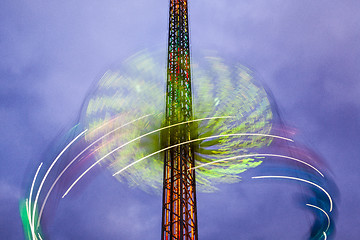 Image showing Danger carousel - big wheel in motion at night