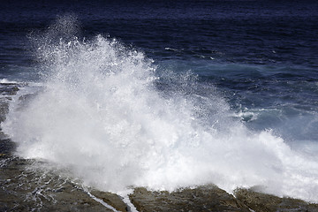 Image showing ocean waves crashing on rocks