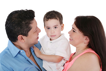 Image showing Happy Family: mother, father and son.  Focus in the boy. 