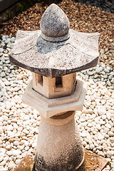 Image showing Oriental pavillion rock lamp decorated in zen garden