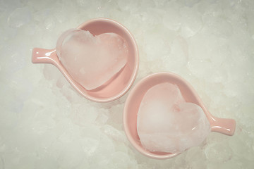 Image showing Couple ice hearts on ice texture background