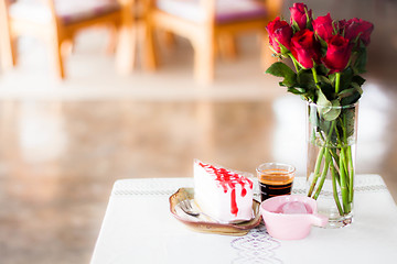 Image showing Single coffee espresso shot and homemade cake  