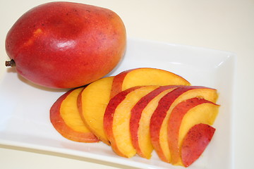 Image showing Sliced and whole mango