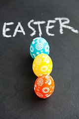 Image showing Colorful Easter eggs and text
