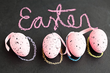 Image showing Pink Easter eggs and text