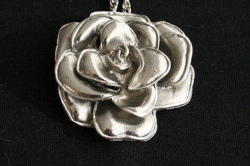 Image showing Piece of jewellery in silver color