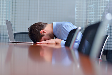 Image showing business man with problems and stress in the office