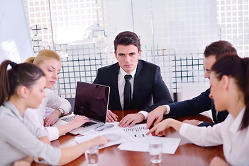 Image showing business people in a meeting at office