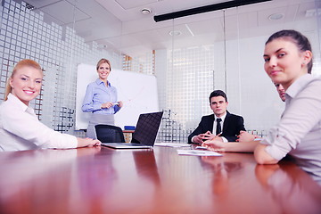 Image showing business people in a meeting at office