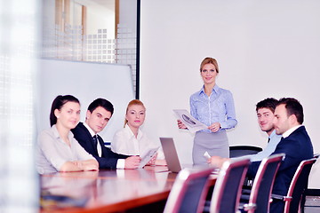 Image showing business people in a meeting at office