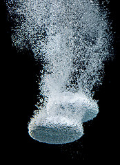 Image showing Effervescent tablet in water with bubbles