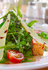 Image showing Fresh salad with a tomato, cheese and the fried meat