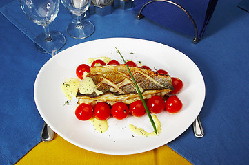 Image showing Fish with tomatoes and a potato